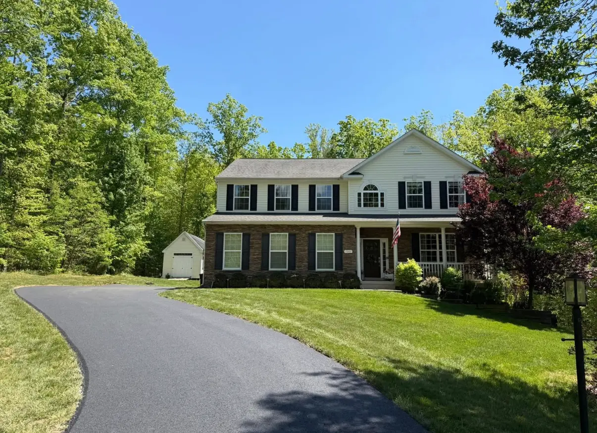 Freshly paved driveway with a new asphalt surface